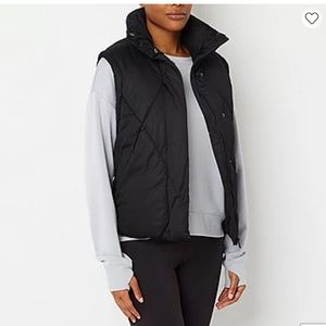 Women’s black puffer vest. NWT